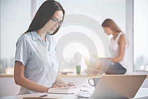 Ladies reading in office