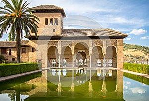 Torre de las Damas in a garden of the Alhambra in Granada, Spain