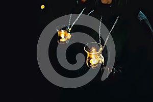 Ladies of the Virgin of Solitude during holy week semana santa in Zamora, Spain with a distinctive medal and with a glass tulip photo