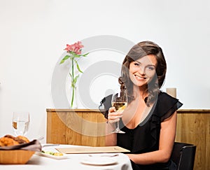 Lady alone in restaurant