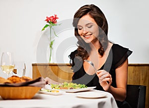 Lady alone in restaurant