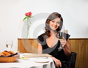 Lady alone in restaurant