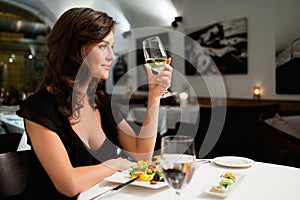 Lady alone in restaurant photo