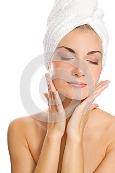 Lady applying moisturizer