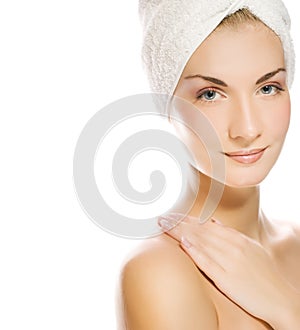 Lady applying moisturizer photo