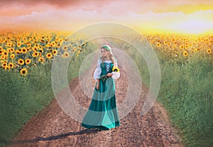 lady with blond braids holds yellow flowers in hands, rural beauty