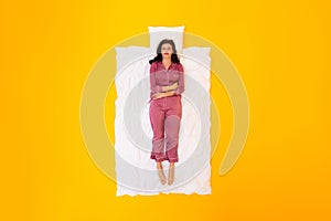 Lady Can't Sleep Suffering From Menstrual Cramps Lying, Yellow Background