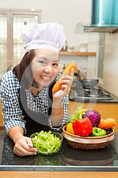 Lady chef preparing ingredient to make salad