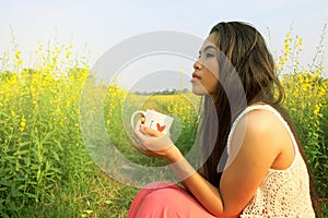 Lady coffee morning flower field