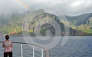 Lady on the Cruise Ship Balcony watching Rainbow