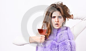 Lady curly hairstyle likes expensive luxury wine. Hedonism concept. Reasons drink red wine in wintertime. Girl fashion