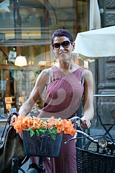 Lady with cycling in the city