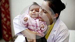 Lady doctor with her child patient.