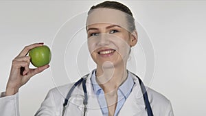 Lady Doctor Showing Green Apple, Health Care