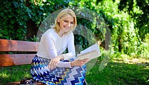 Lady enjoy poetry in garden. Romantic poem. Enjoy rhyme. Woman happy smiling blonde take break relaxing in garden