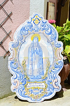Lady of Fatima in painted old ceramic tiles sintra, Portugal photo