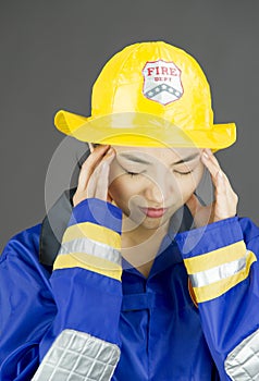 Lady firefighter suffering from headache