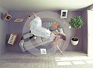 A lady flies in zero gravity room