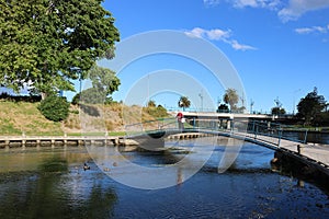 Lady on footbridge, Taylor River, Blenheim, NZ