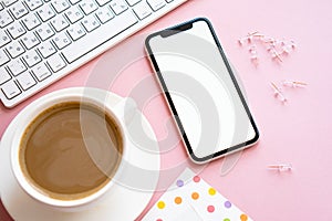 Lady freelancer's home pastel pink workplace, cup of coffee and smartphone mock-up