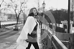 Lady in fur coat outdoors