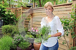 Lady gardener in the garden..