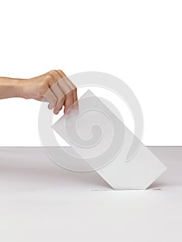 Lady hand putting a voting ballot in slot of white box