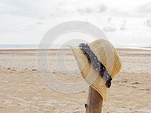 Lady hat on the top pole