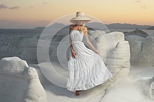 Lady in hat in an unusual landscape photo