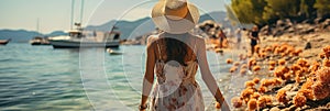 A lady with a hat walking toward the beach area