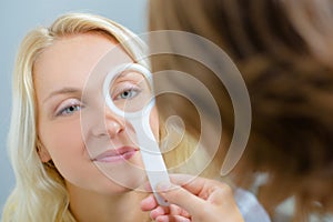 Lady having eye examination