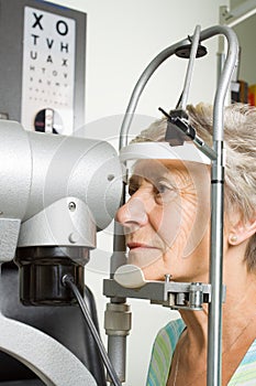 Lady having eye test examination