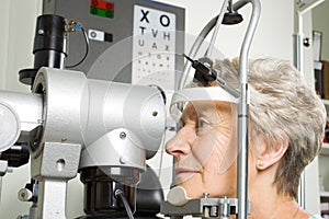 Lady having eye test examination