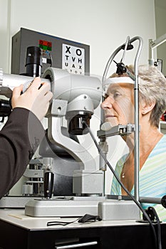 Lady having eye test examination