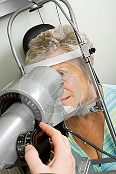 Lady having eye test examination