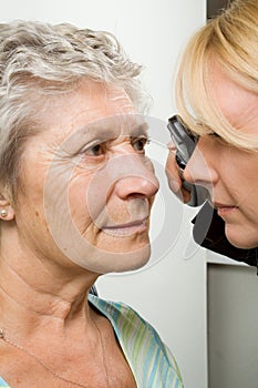 Lady having eye test examination