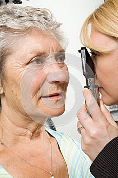 Lady having eye test examination