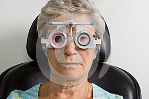 Lady having eye test examination