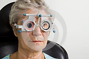 Lady having eye test examination