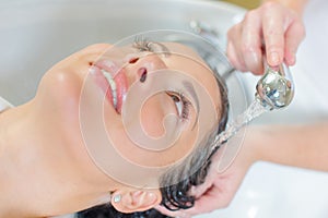 Lady having hair washed