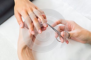 Lady having a manicure on her fingernails