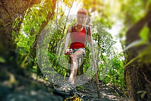 Lady hiker in the forest