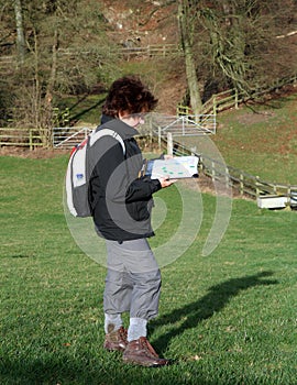 Lady Hiker reading a Map