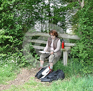 Lady Hiker reading a Map