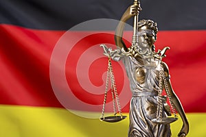 Lady justice against German flag