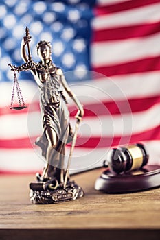 Lady Justice and American flag. Symbol of law and justice with U