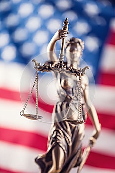 Lady Justice and American flag. Symbol of law and justice with U