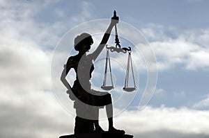 Lady Justice freed under the sky