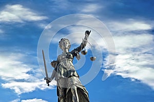 Lady justice at the roemer square in Frankfurt photo
