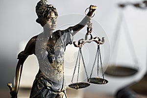 Lady of Justice statue. The criminal law.